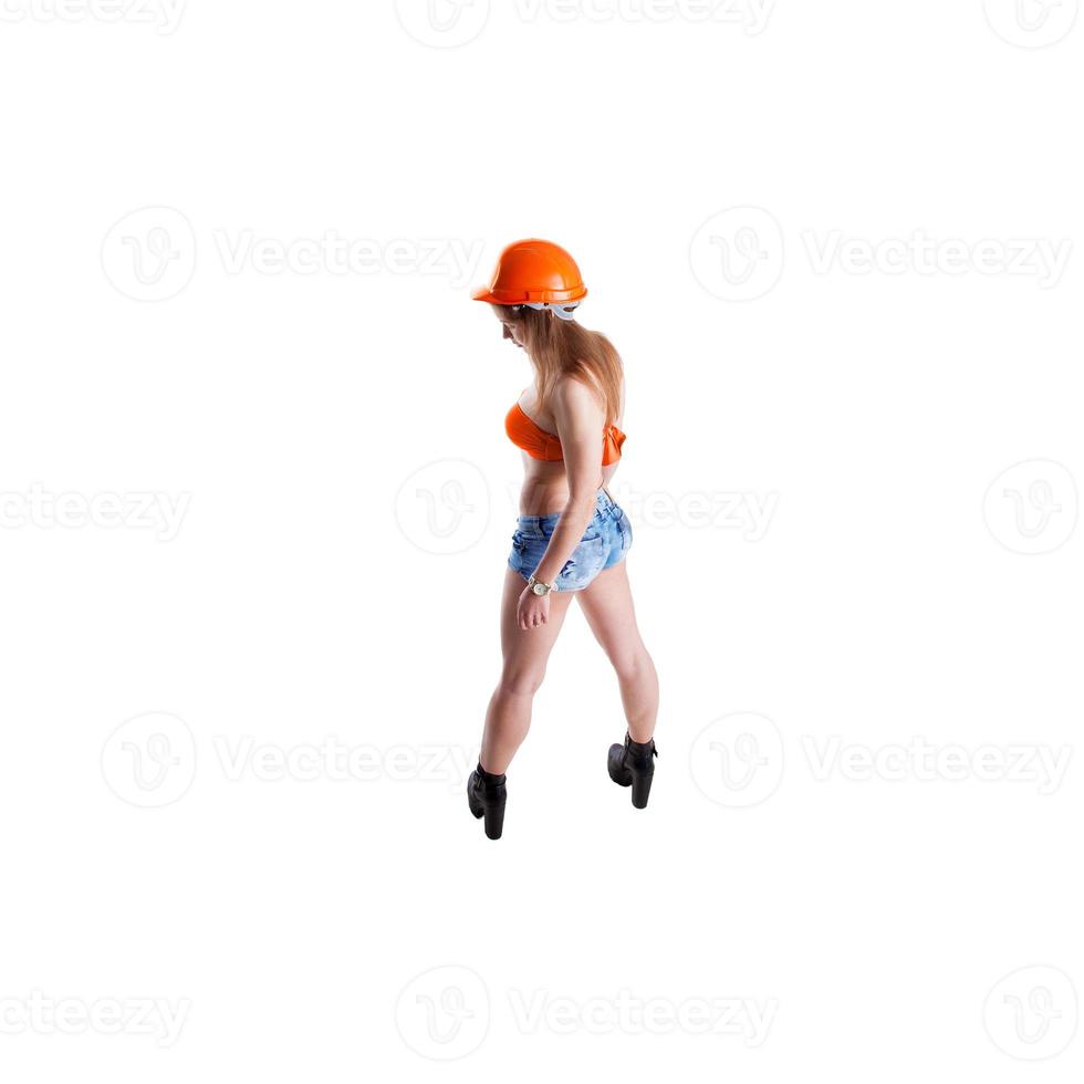 young woman builder in studio photo