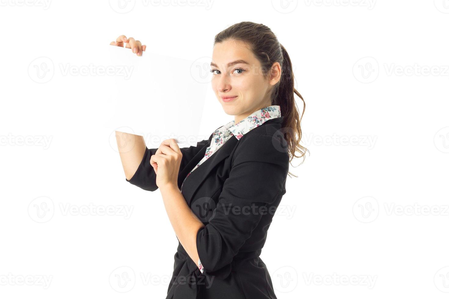 woman in uniform with white placard in hands photo