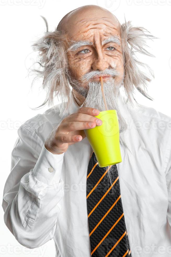 Grandfather drink from cup in studio photo