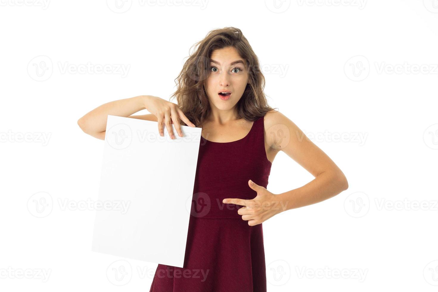 girl in red dress with white placard photo