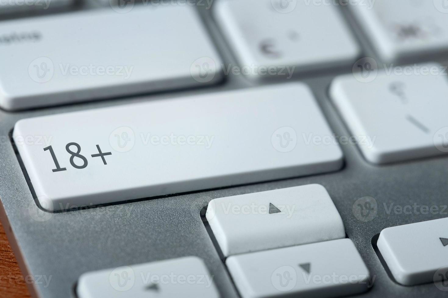 18 plus button on keyboard photo