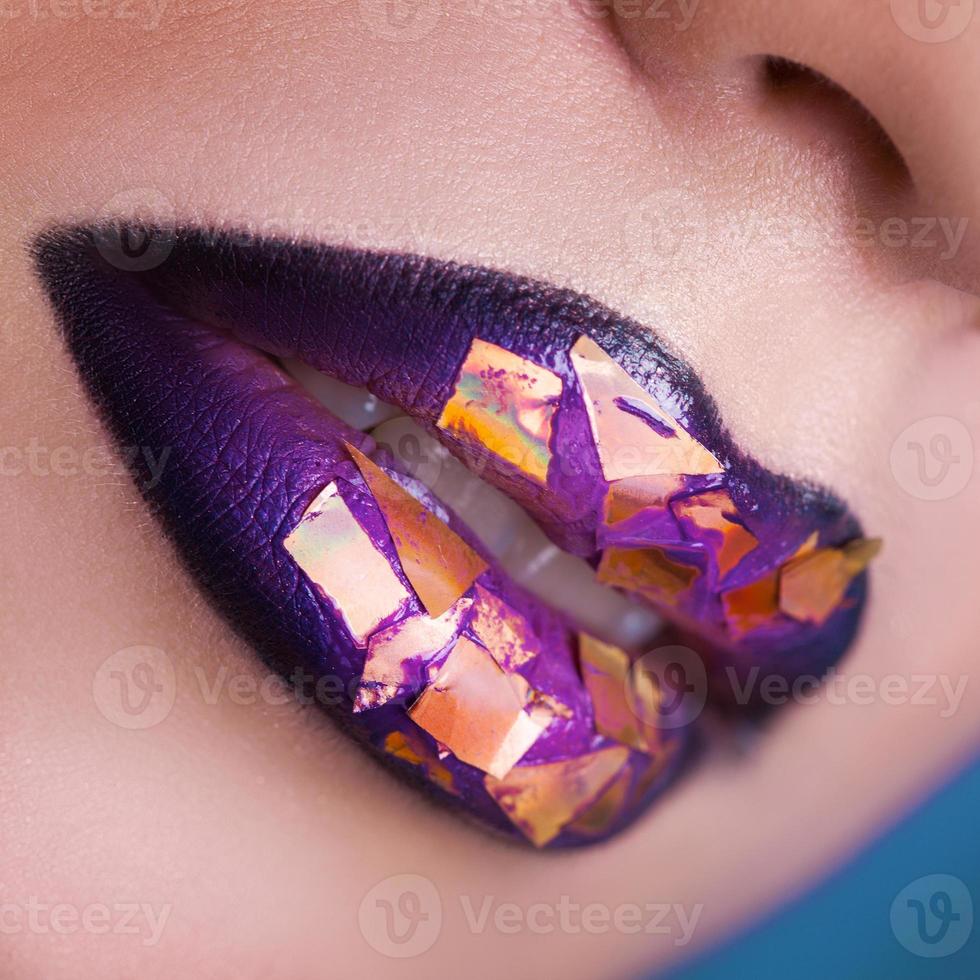 Square photo of woman lips with creative make up. macro