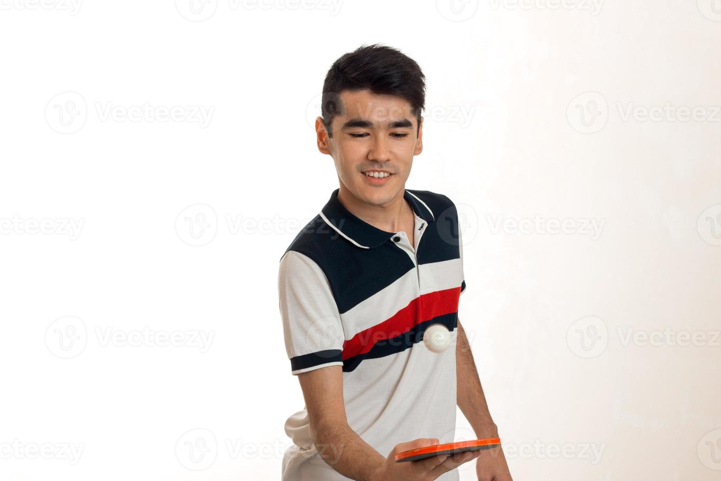 young happy sportsman practicing ping-pong isolated on white background photo