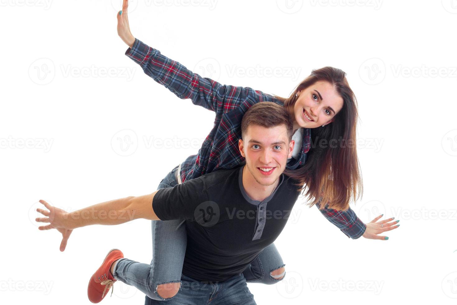 loving couple having fun and the guy wears a girl on hands photo