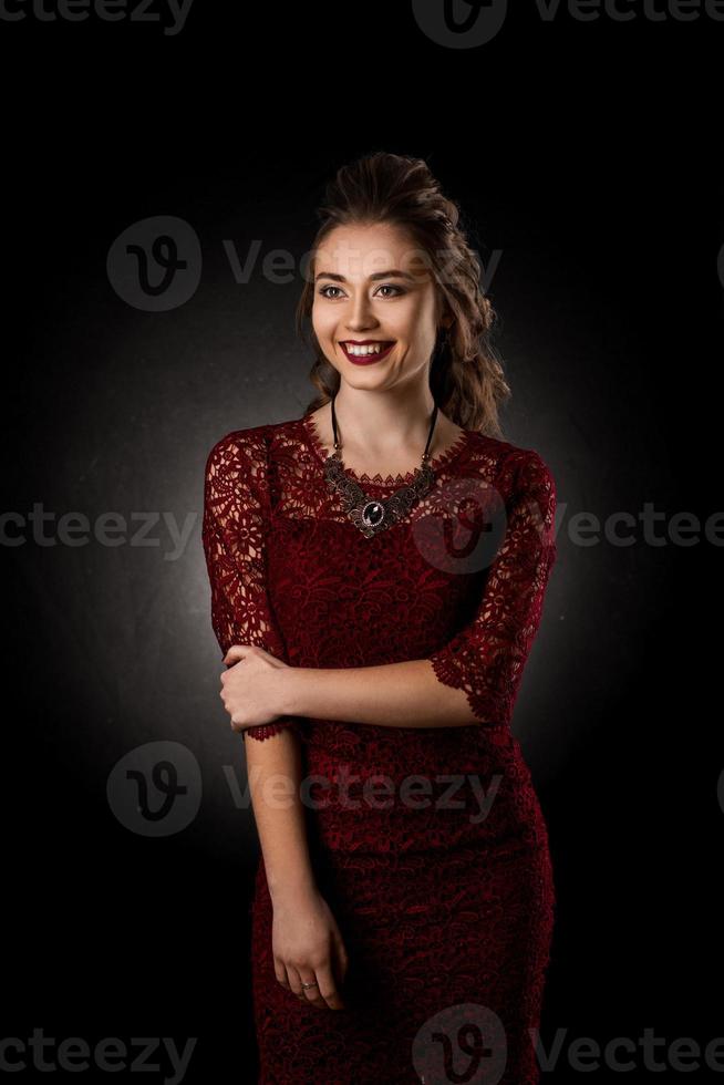 Charming young girl with beautiful curly hairstyle photo