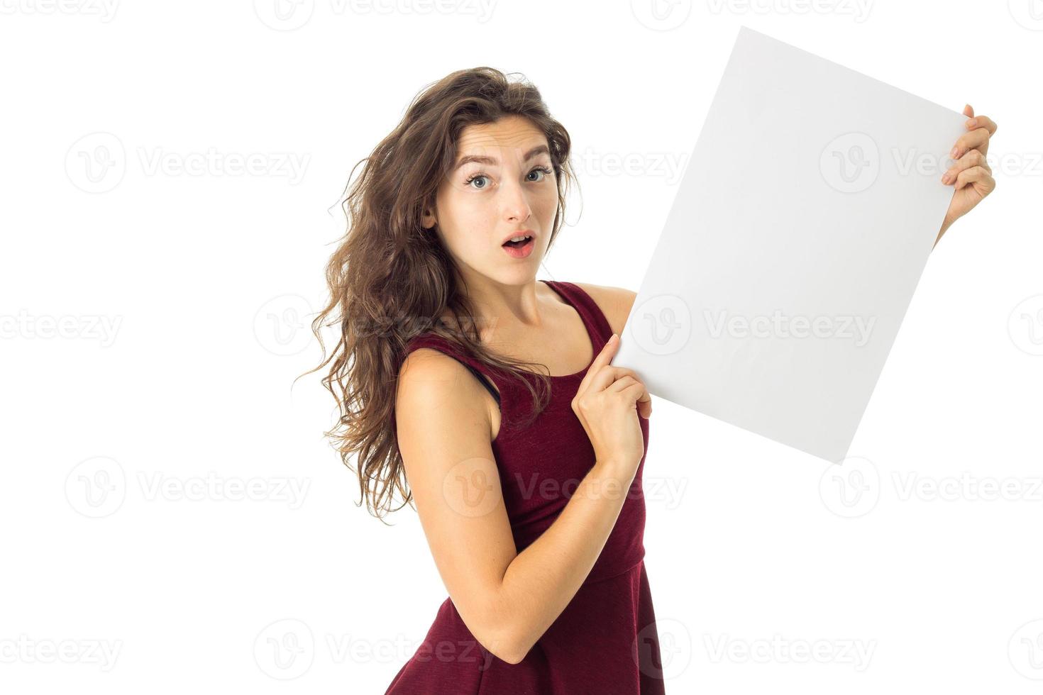 girl in red dress with white placard photo