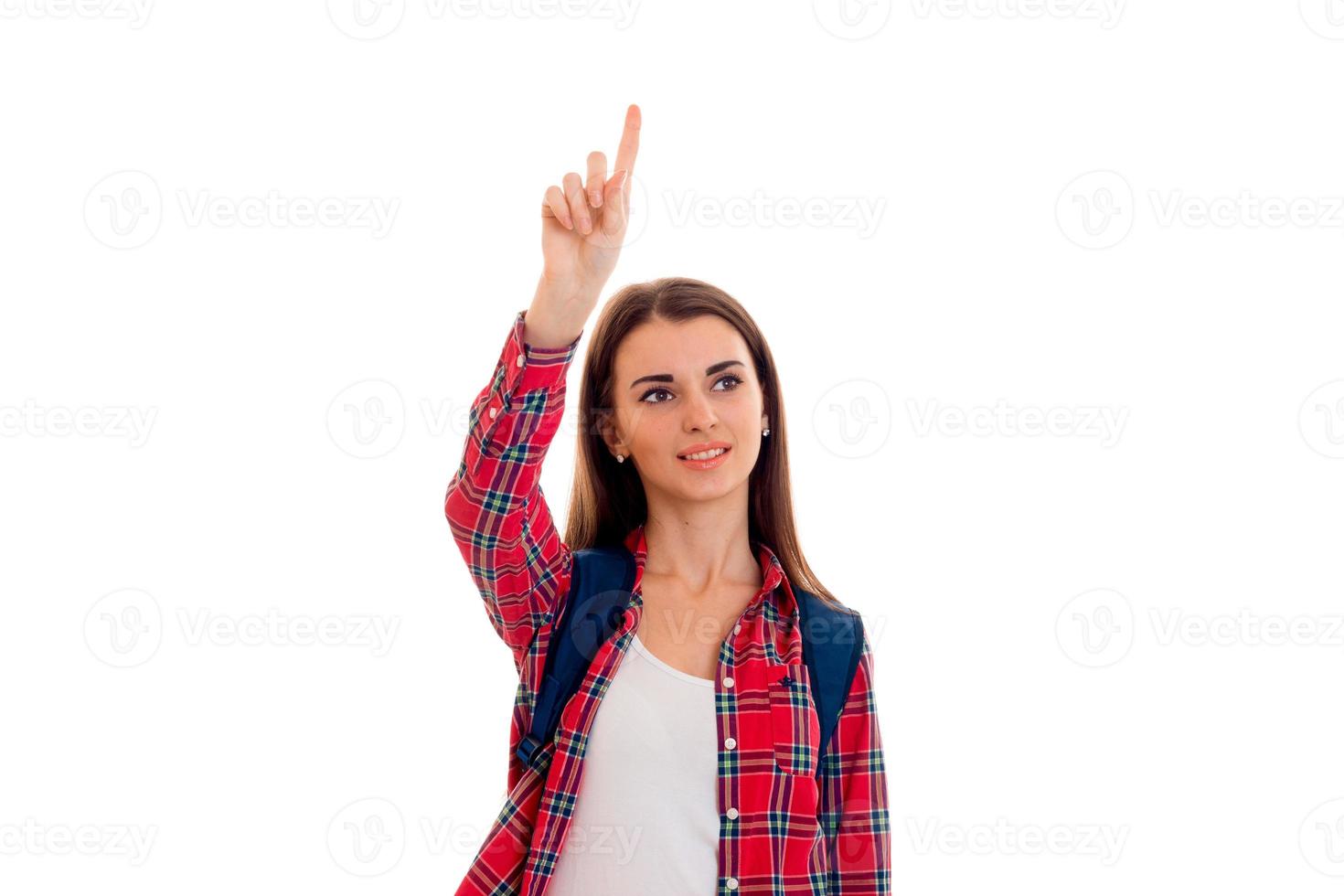 young beauty student girl with backpack posing isolated on white background in studio photo