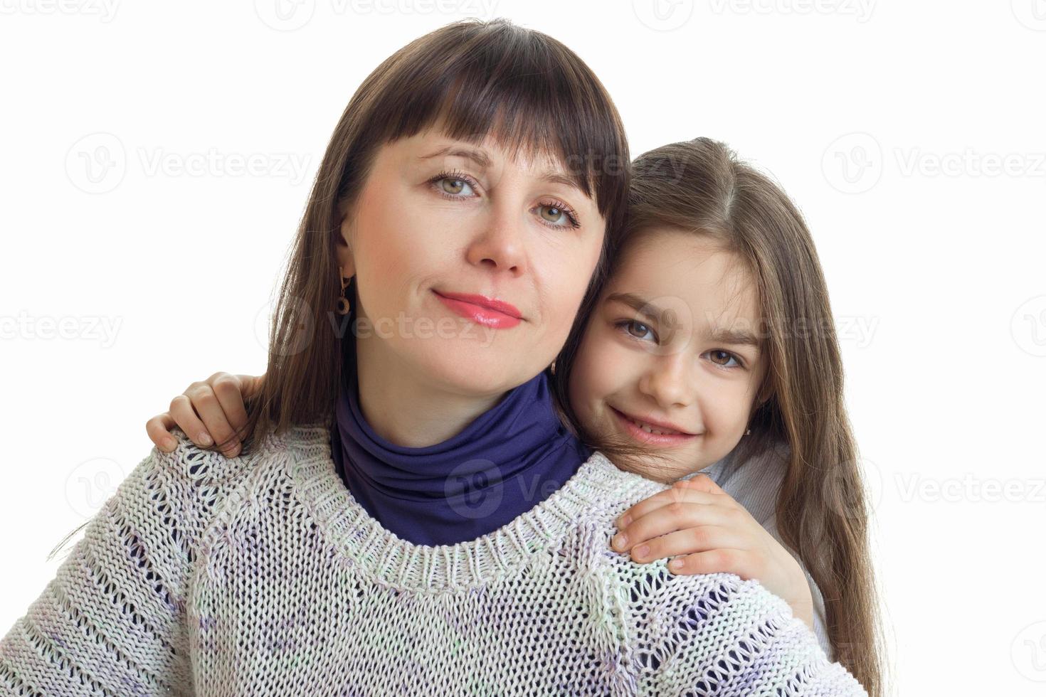 close-up portrait of a pretty young woman and little girl photo