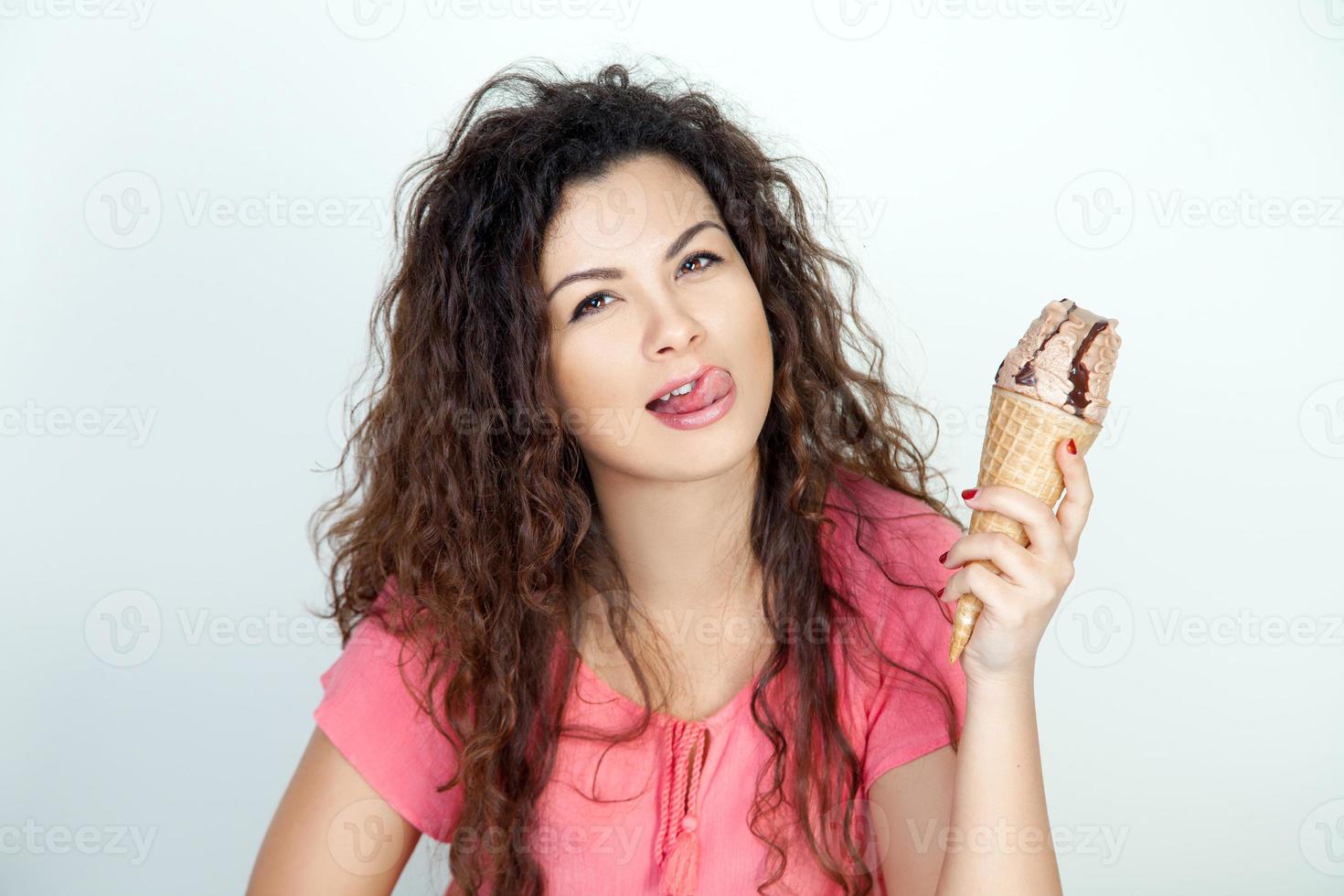 sexy woman eats ice cream cone photo