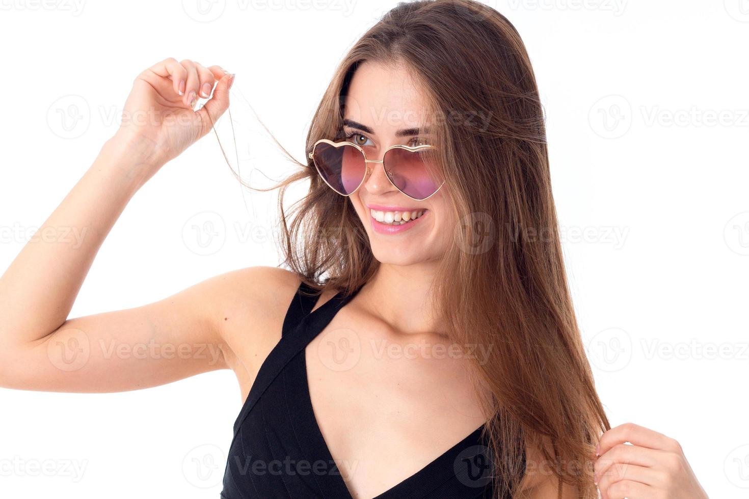 cheerful young girl in sunglasses photo