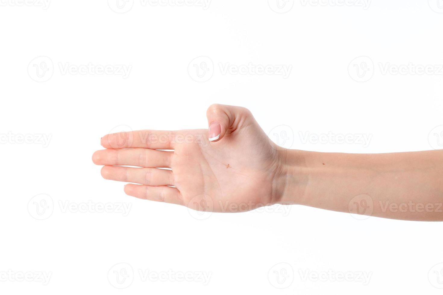 female hand stretched towards direct hands isolated on white background photo