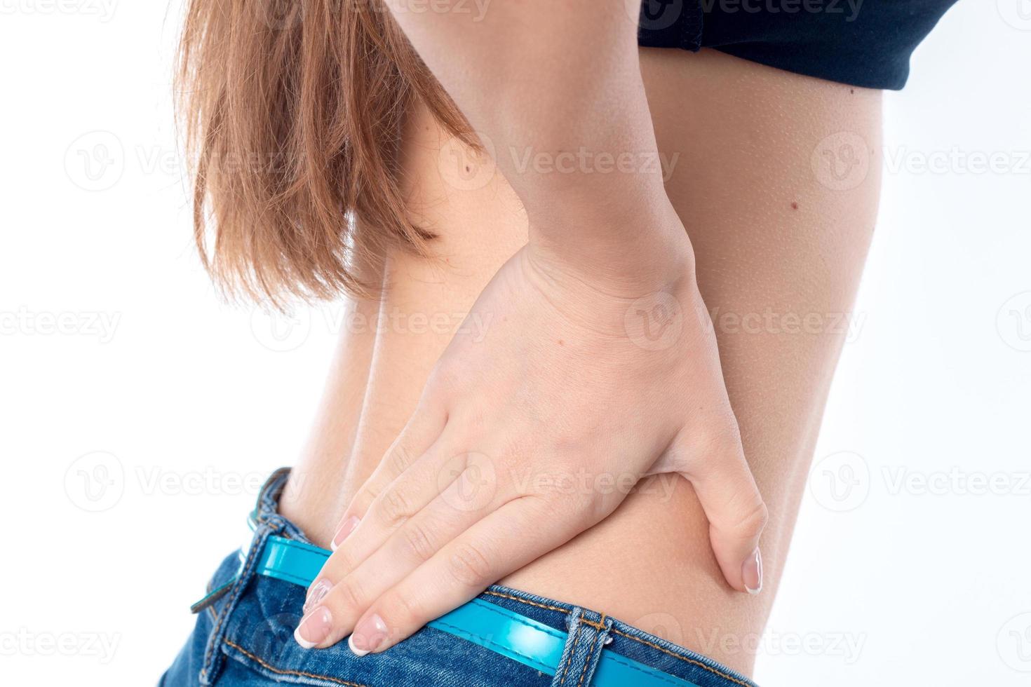girl put a hand on side close-up photo