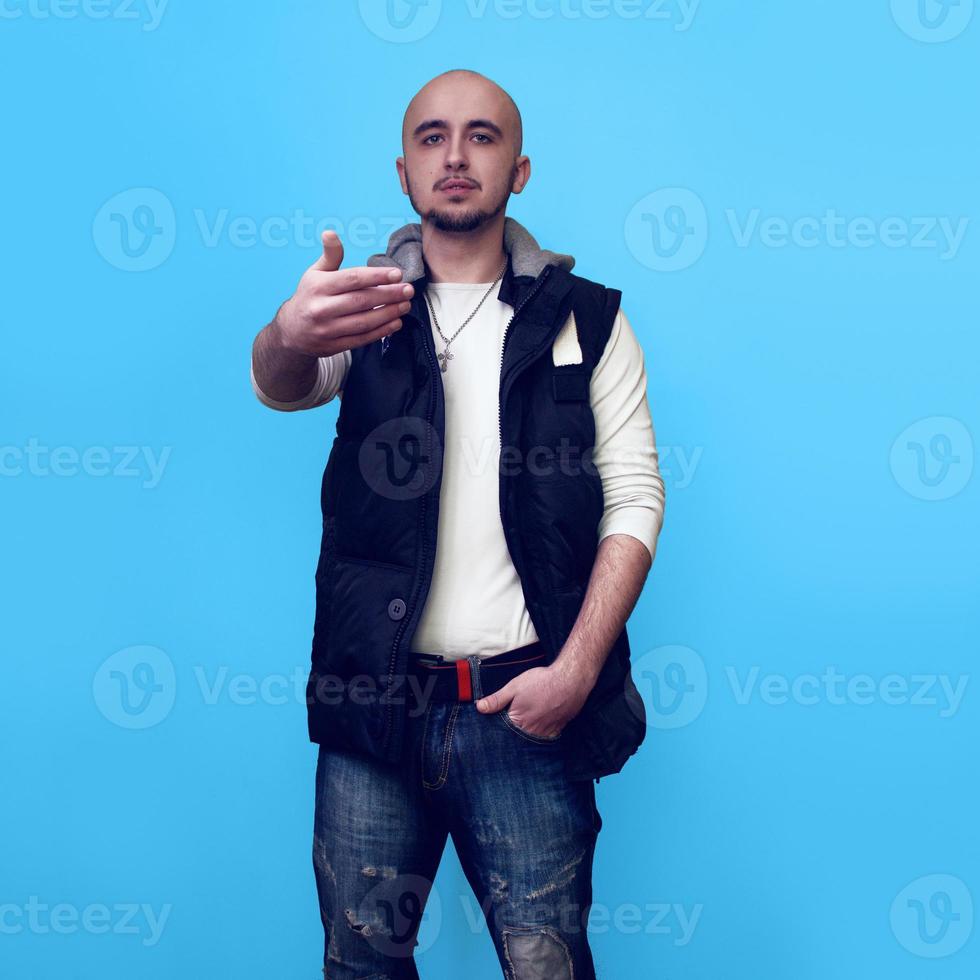 Modern man on blue background photo