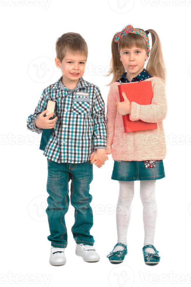 Children with books on a white background photo