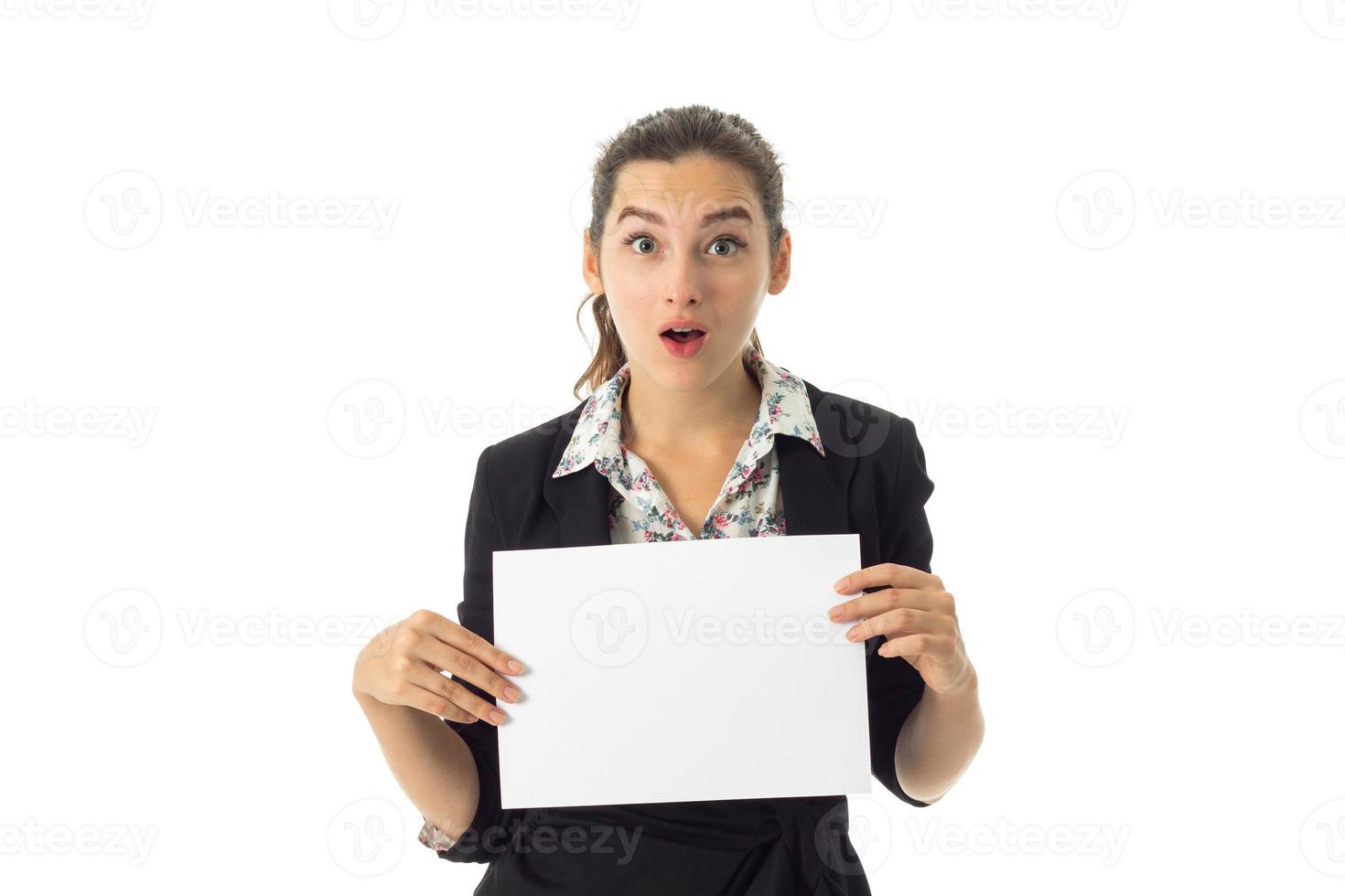 woman in uniform with white placard in hands photo