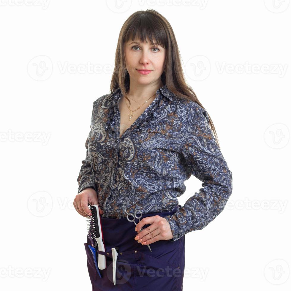 cheerful woman stylist with tools in hands photo