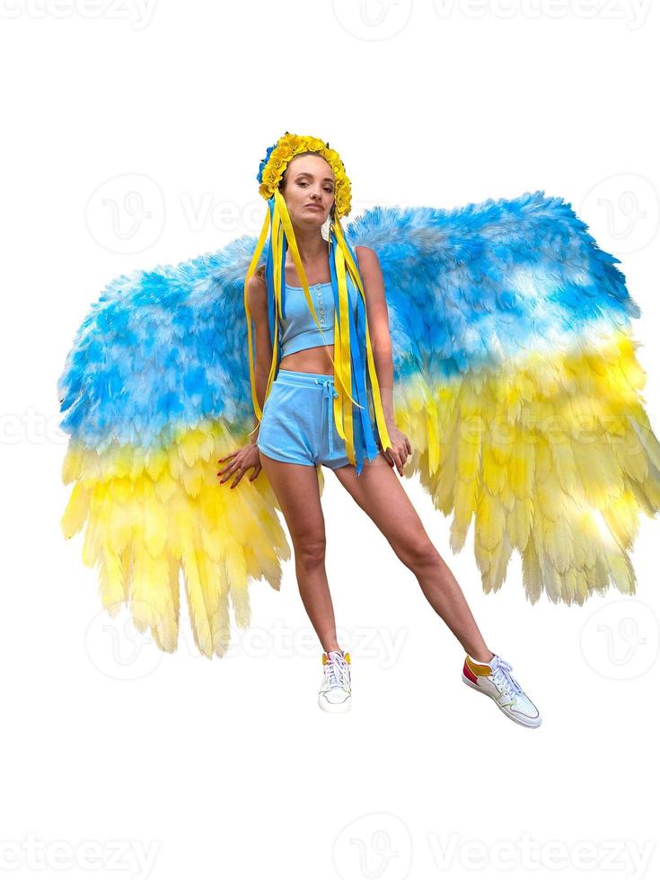 Charming woman in Blue and yellow wreath and wings photo