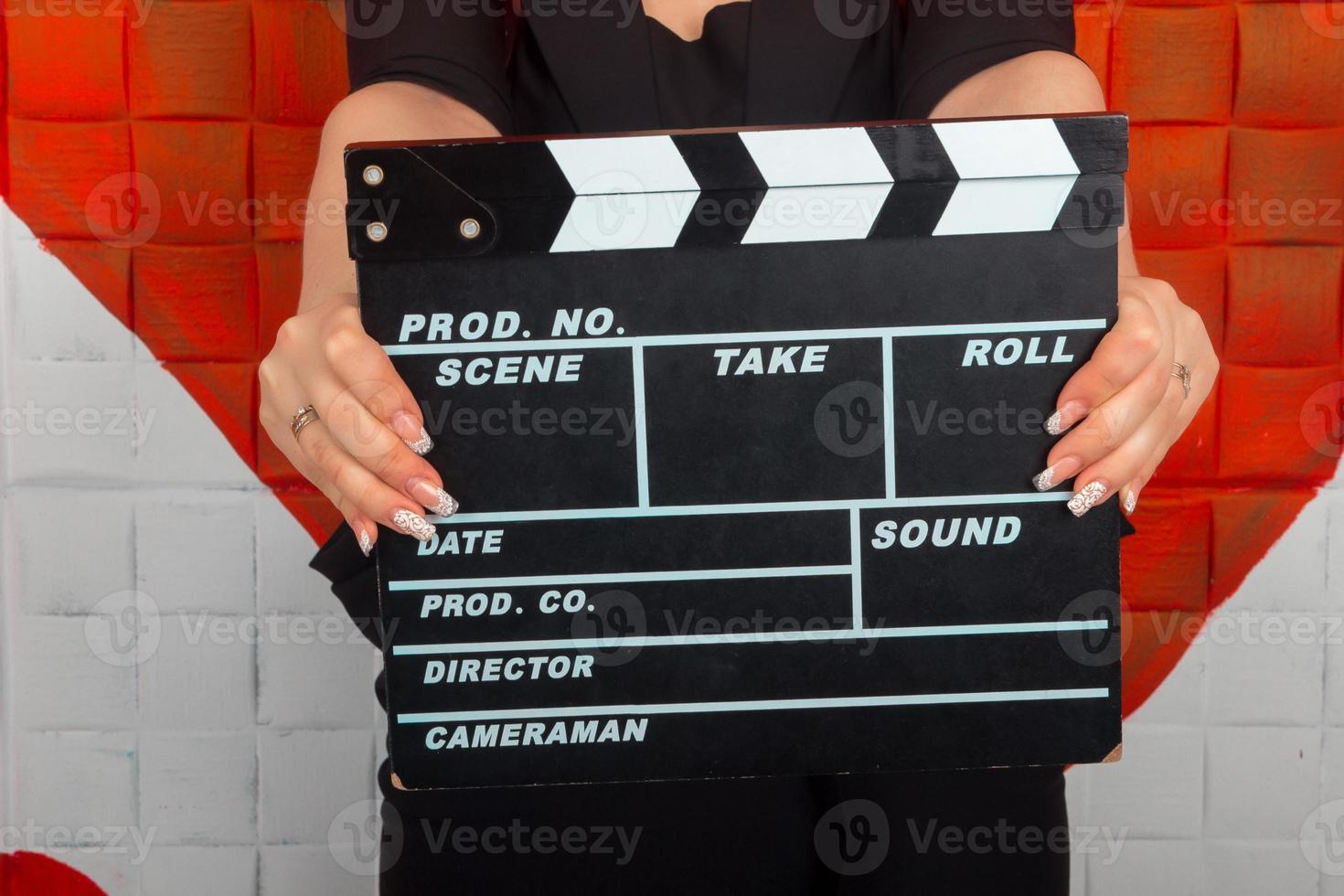 Woman with the clapper photo