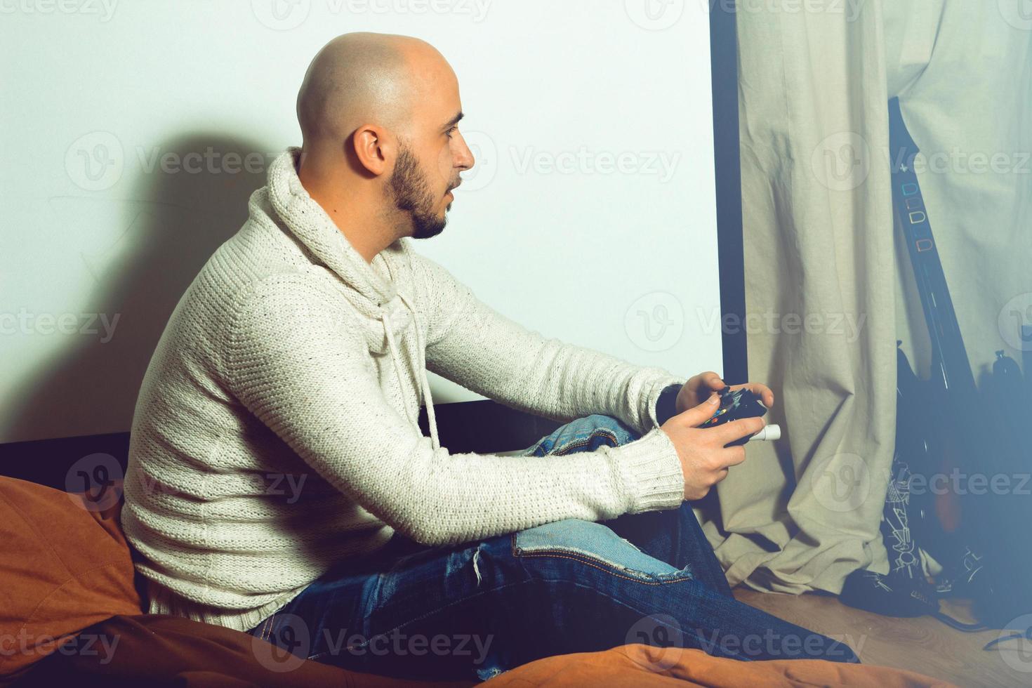 horizontal picture guy playing computer games photo