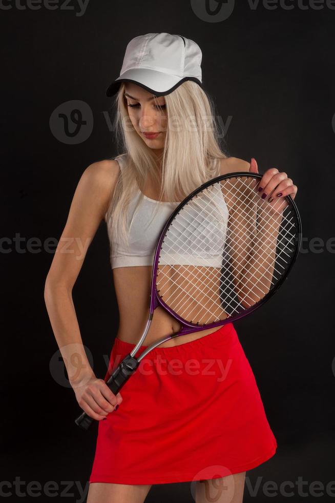 Tennis player with racket photo