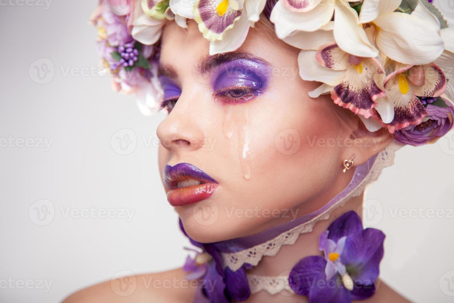 horizontal portrait of Sad young woman crying photo