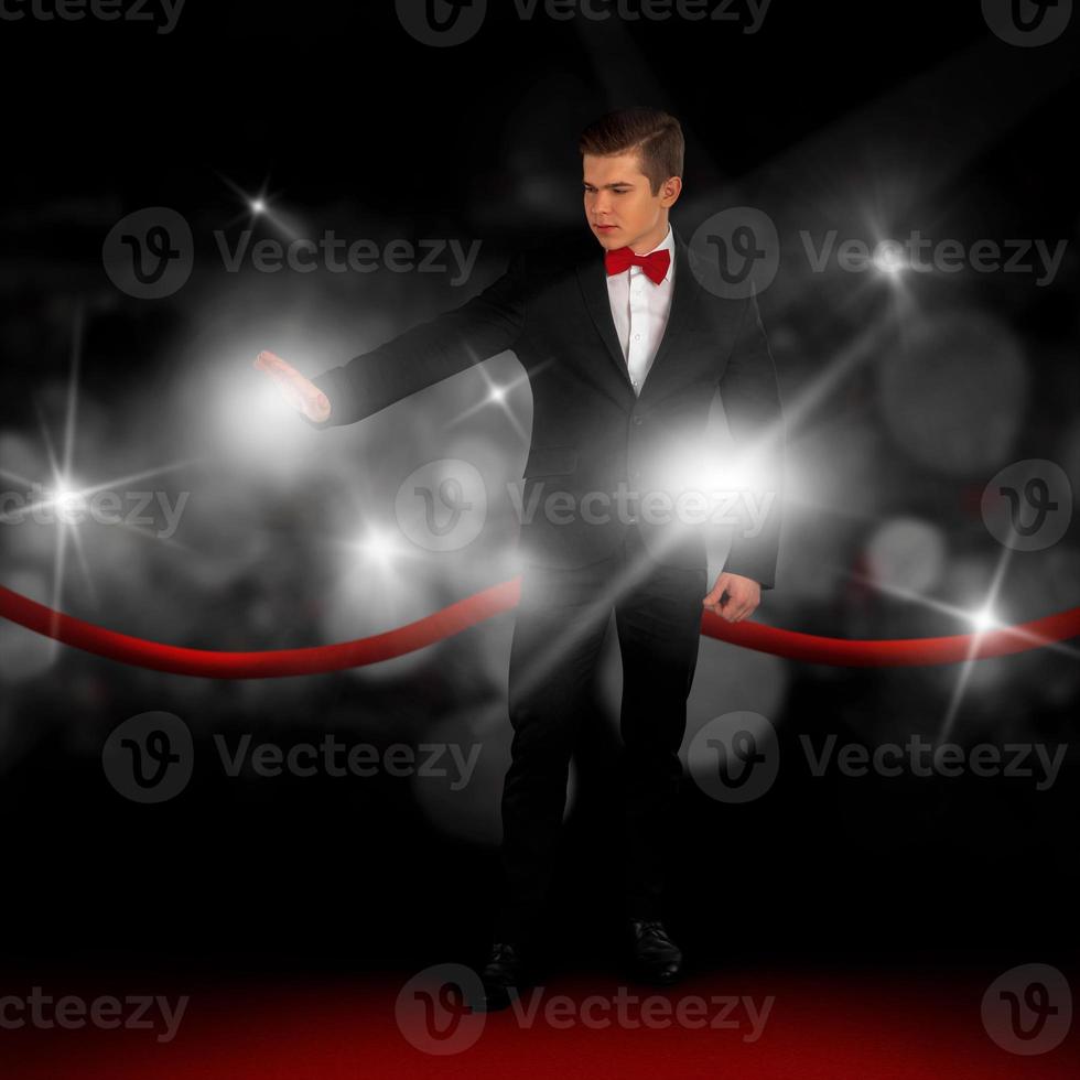guy in a suit on the red carpet photo