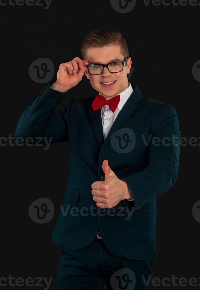 Man in glasses is posing photo