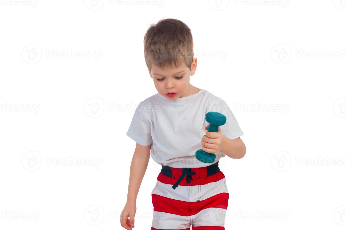 Little boy with a dumbbell photo