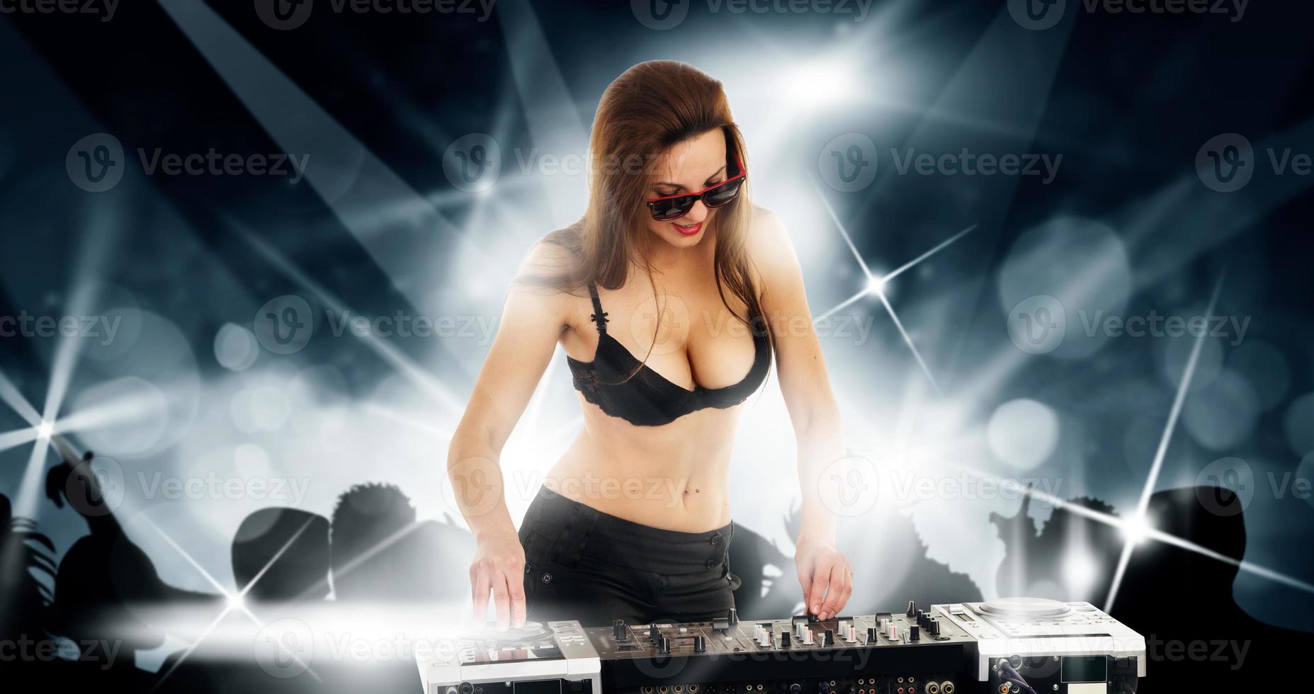 Girl in the black bra with the mixer photo