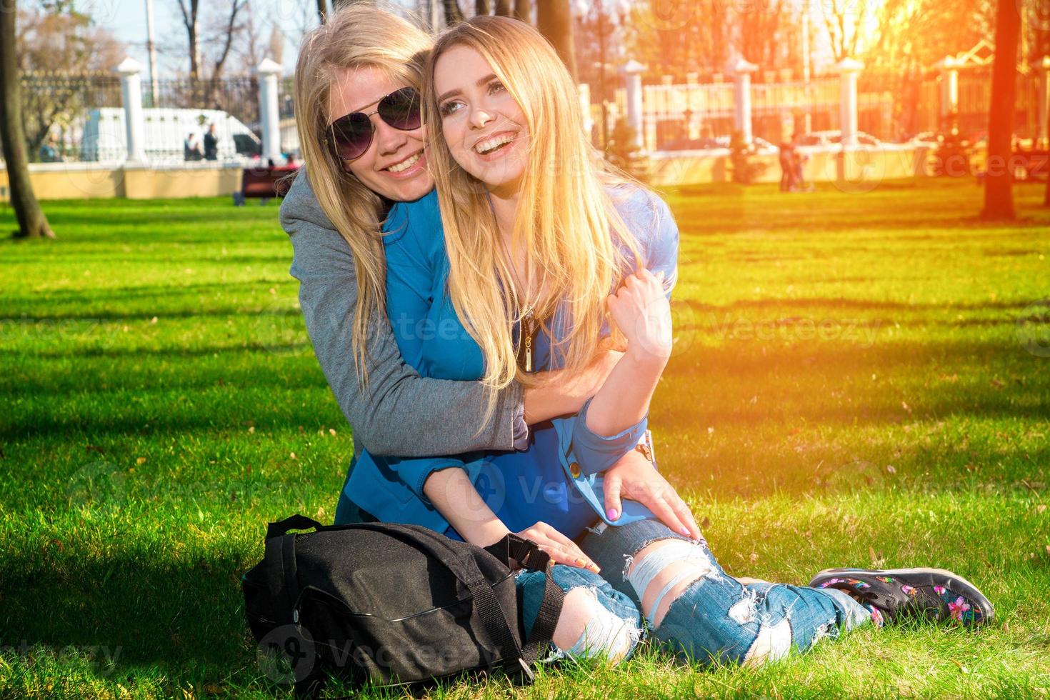 Girls having fun in the park photo