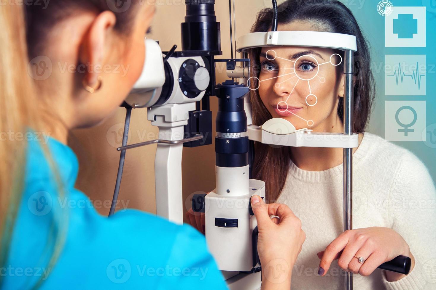 beautiful brunette passes check vision an ophthalmologist photo