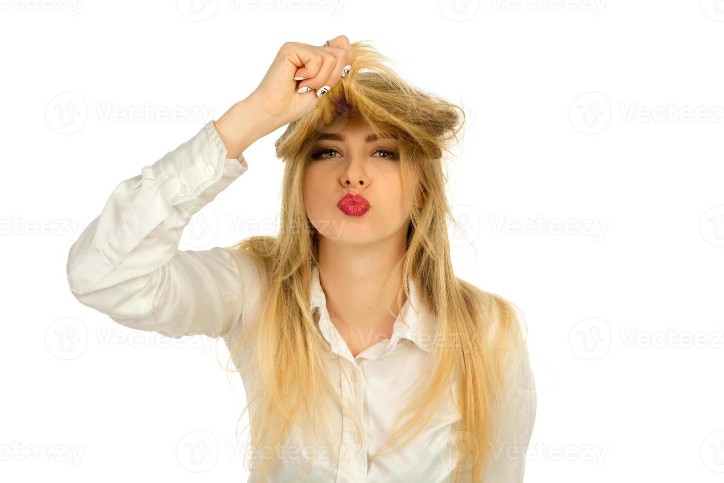 girl making air kiss in the studio photo