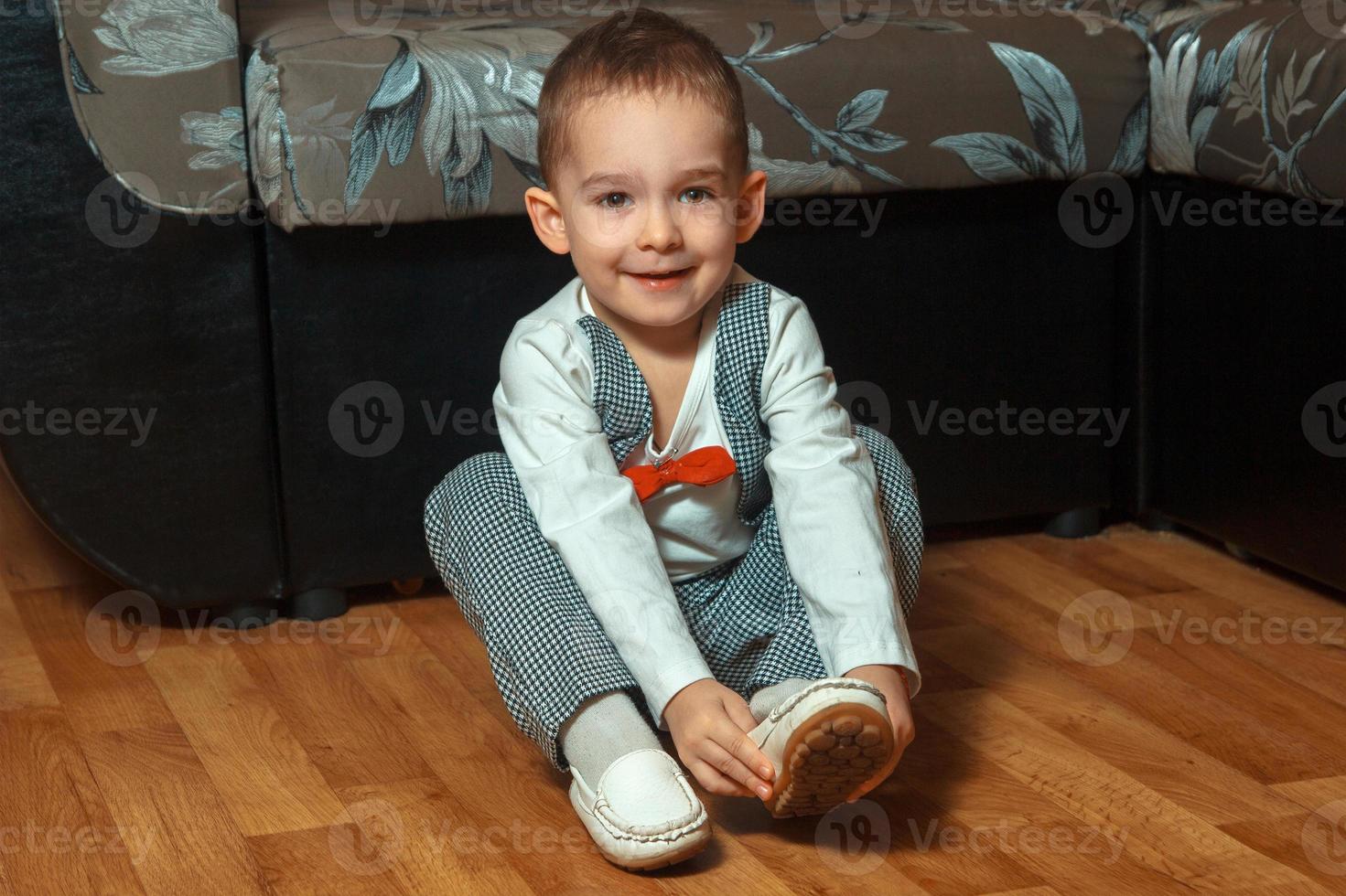 little boy smiling on camera photo