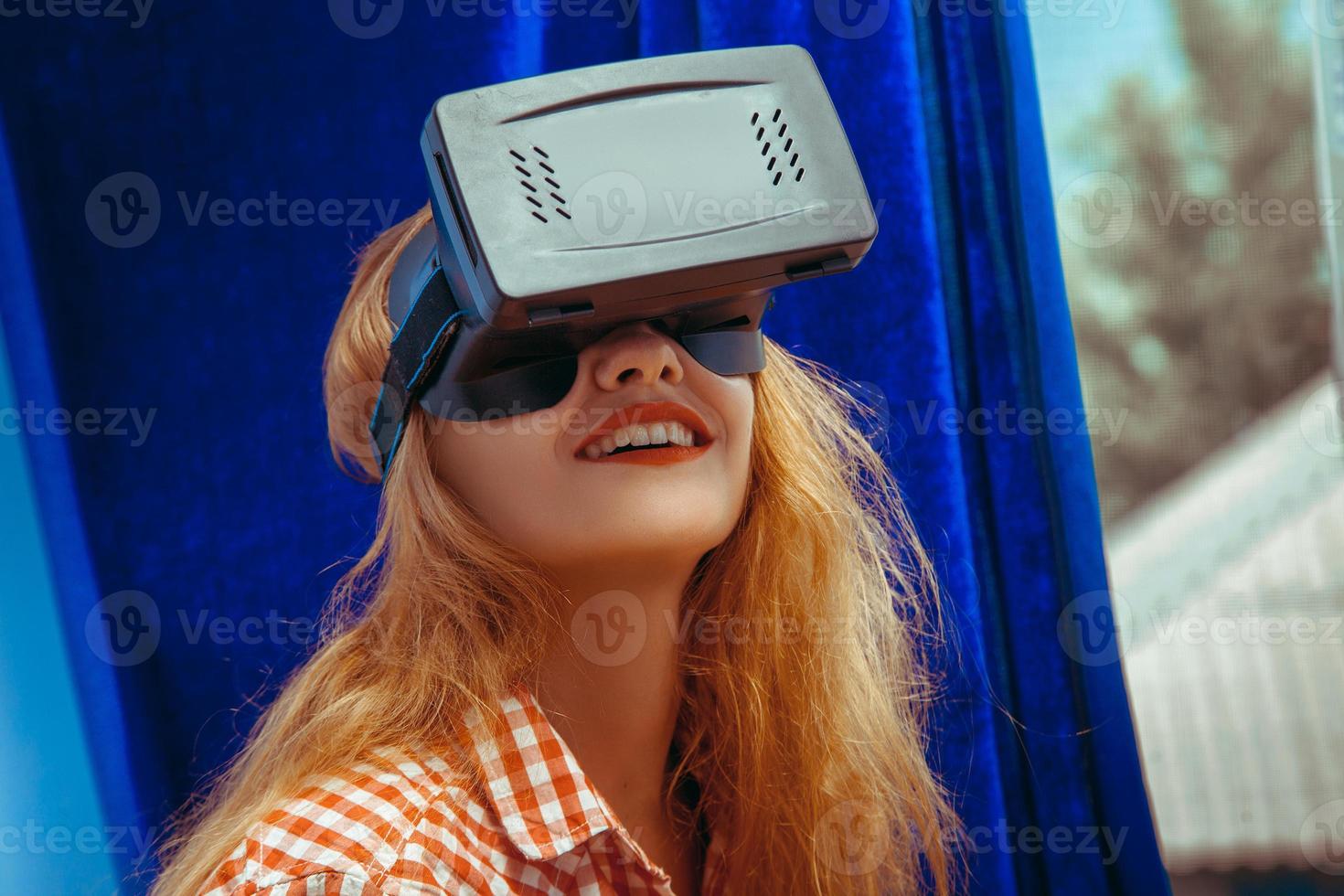 happy girl in vr glasses photo