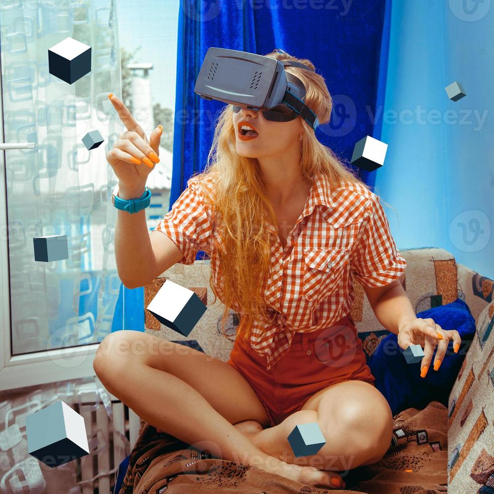 woman in virtual reality helmet photo