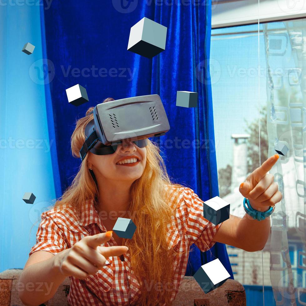 woman in virtual reality helmet photo
