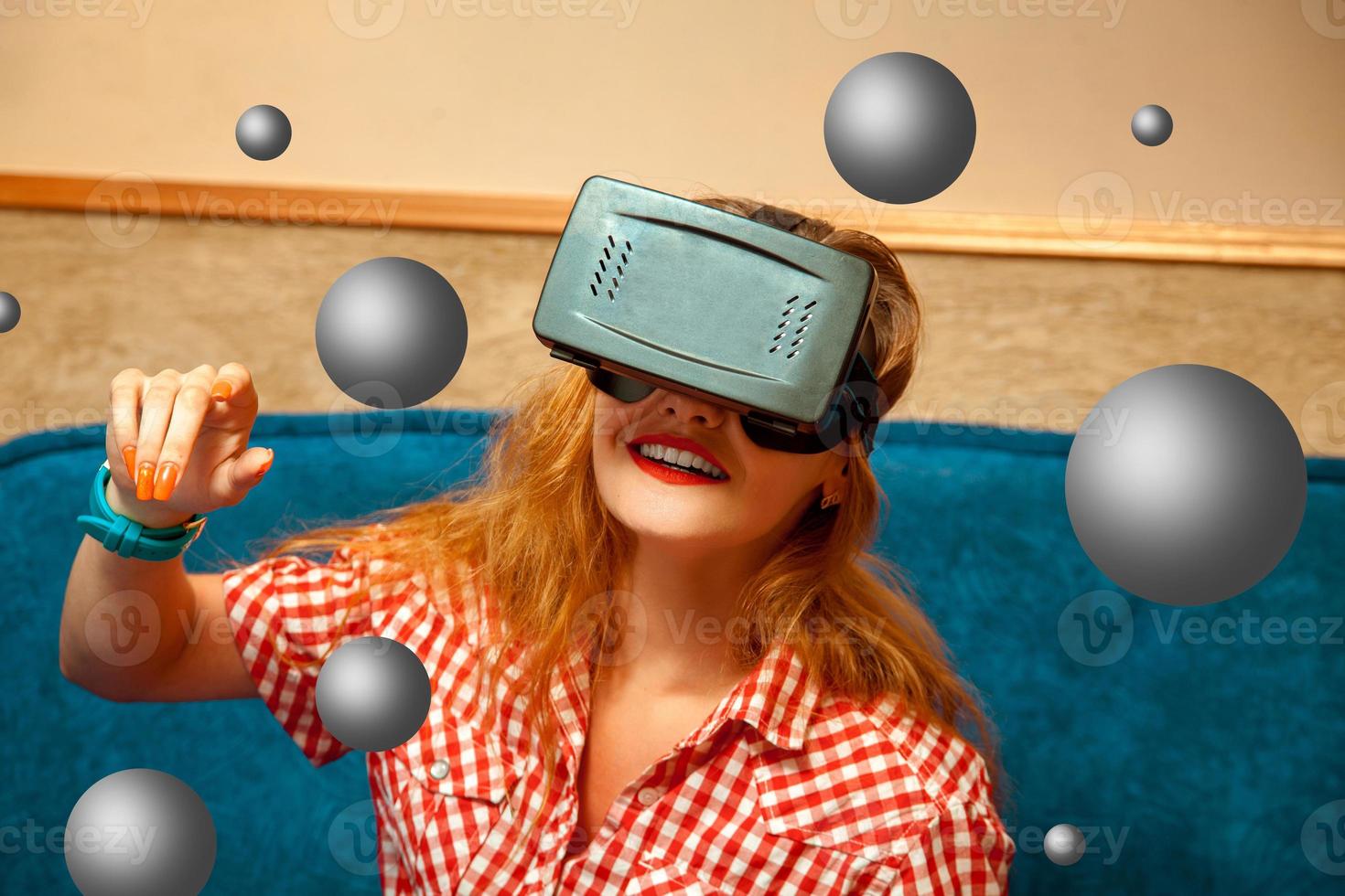 girl smiling in virtual reality glasses photo