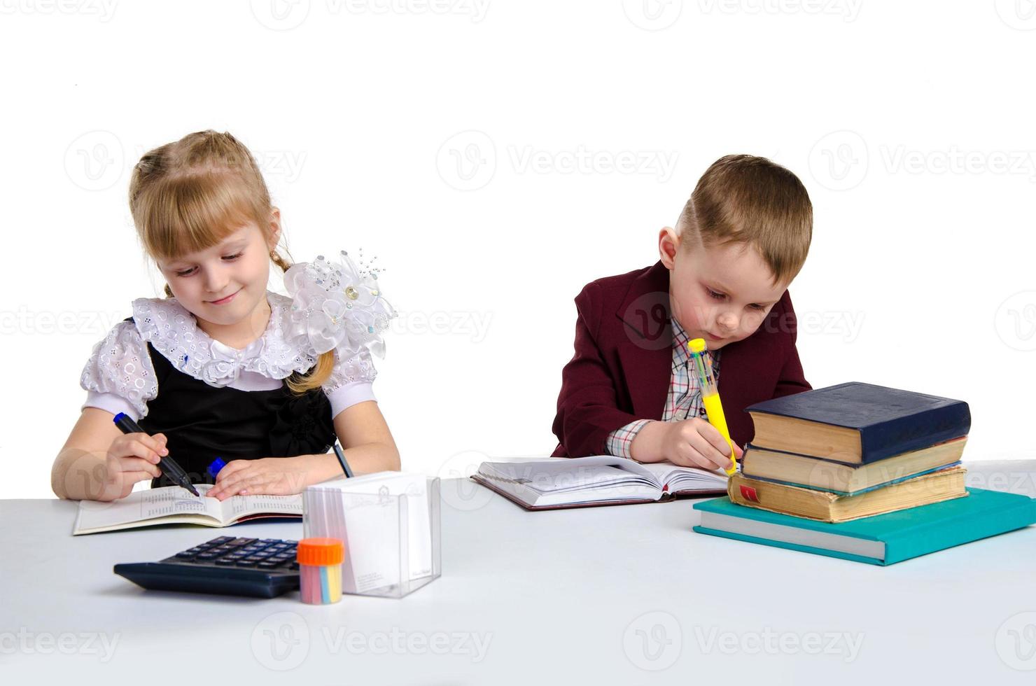 couple of pupils in uniform studying photo