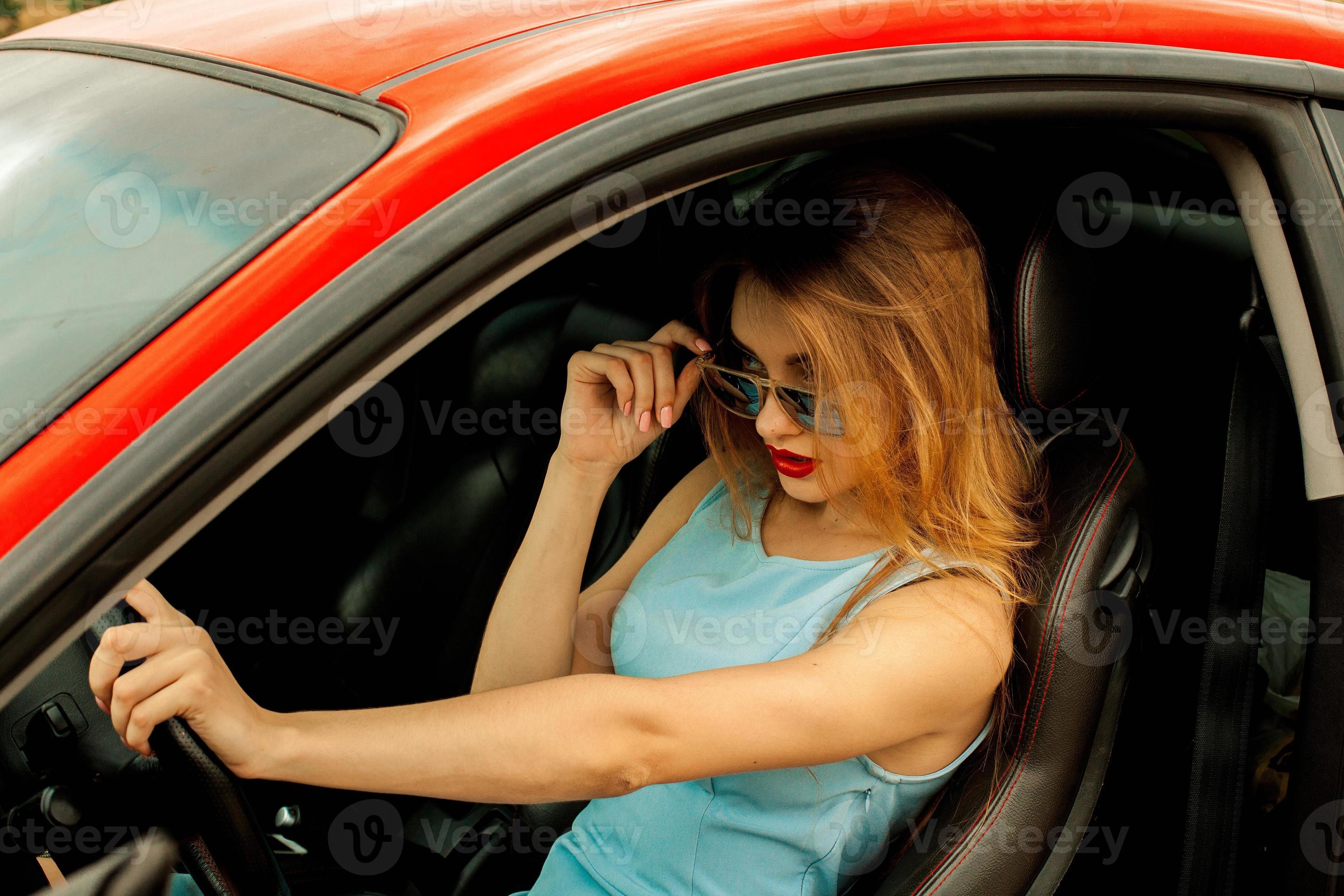 young lady in car 16505875 Stock Photo at Vecteezy