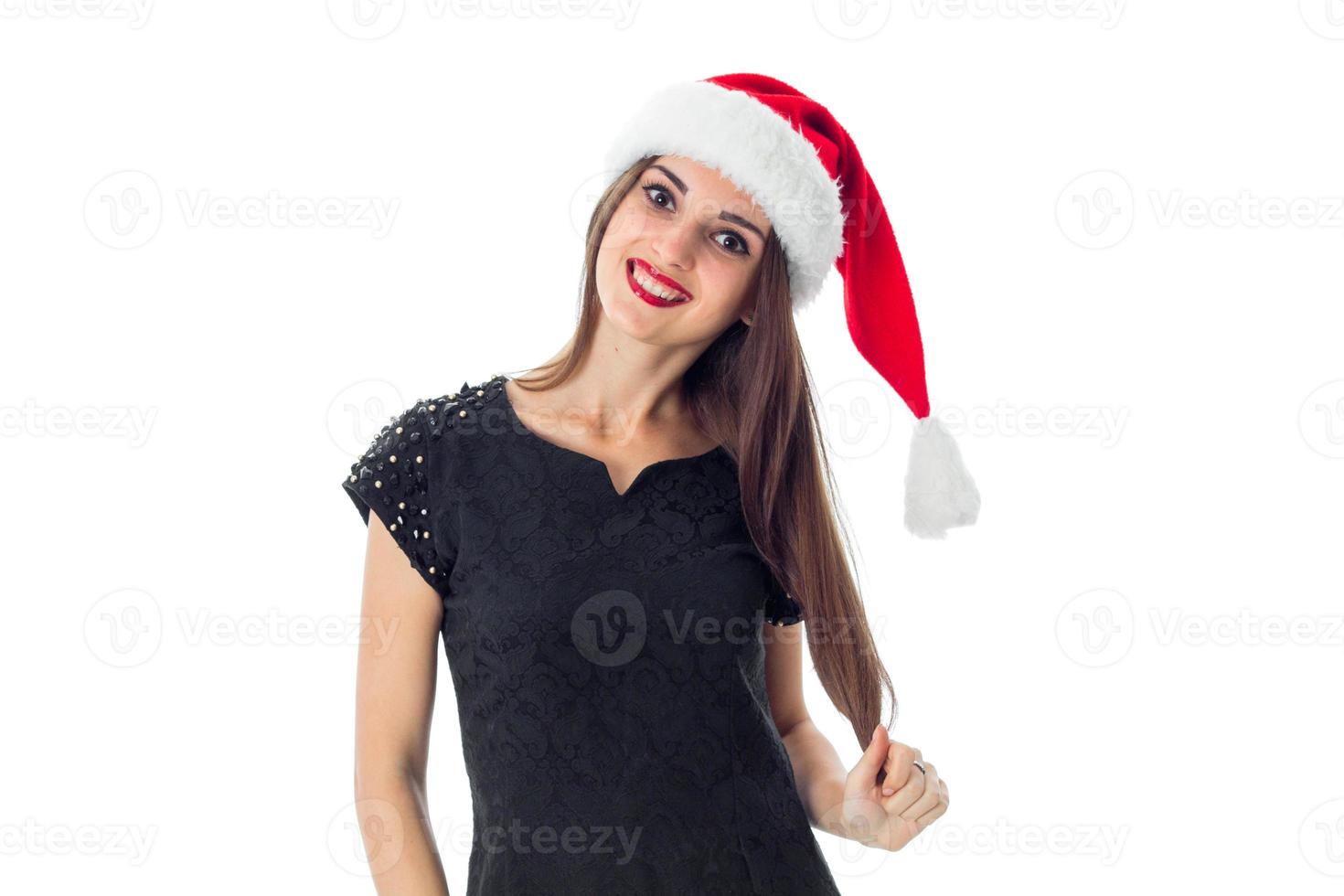 cheerful girl in santa hat photo