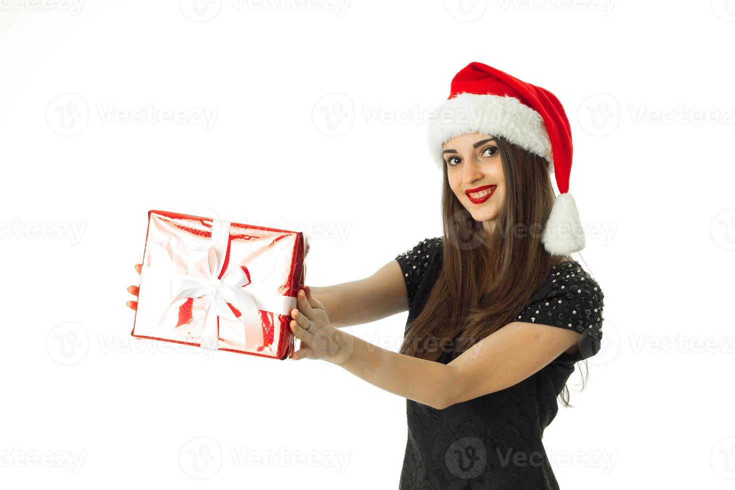 beautiful woman in santa hat smiling photo