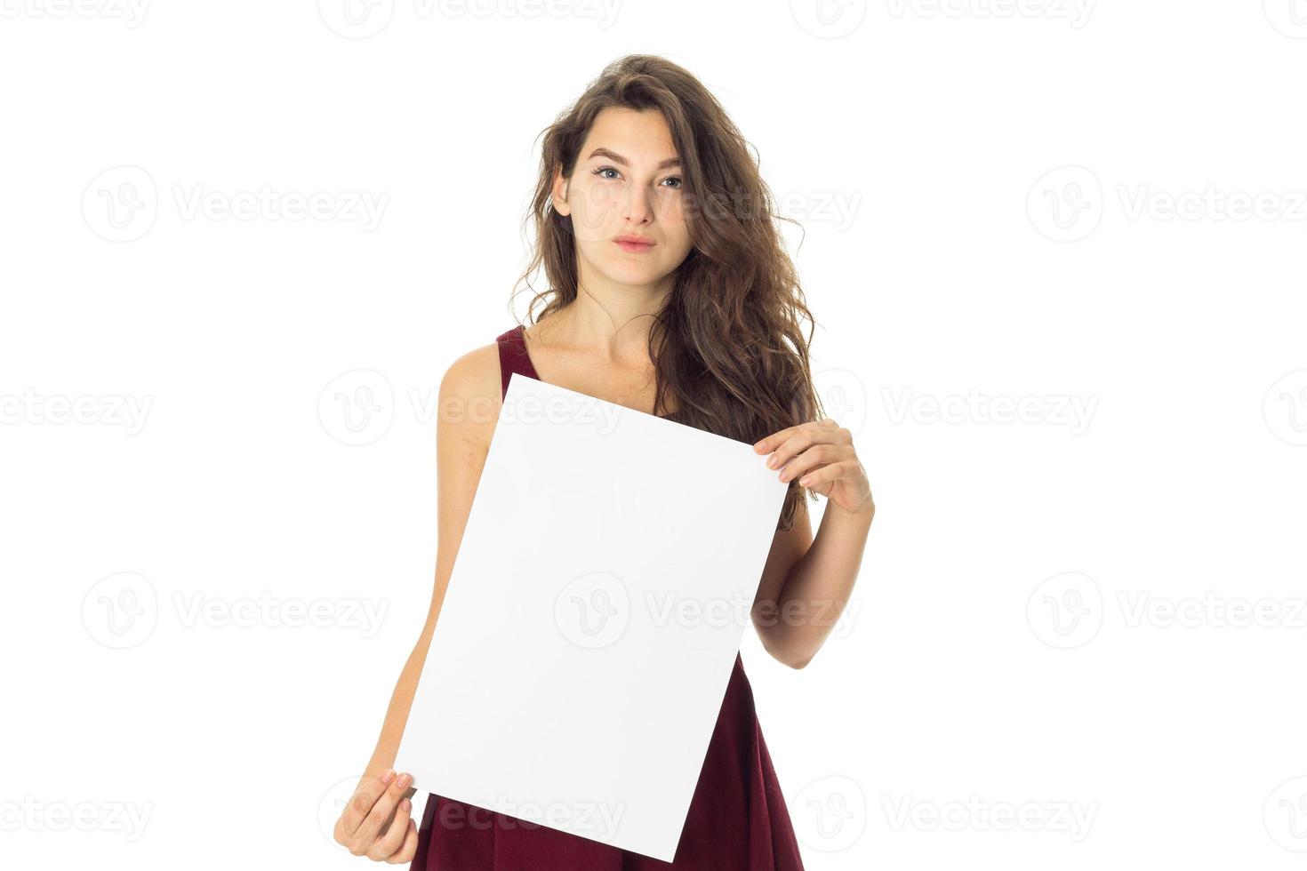 girl in red dress with white placard photo