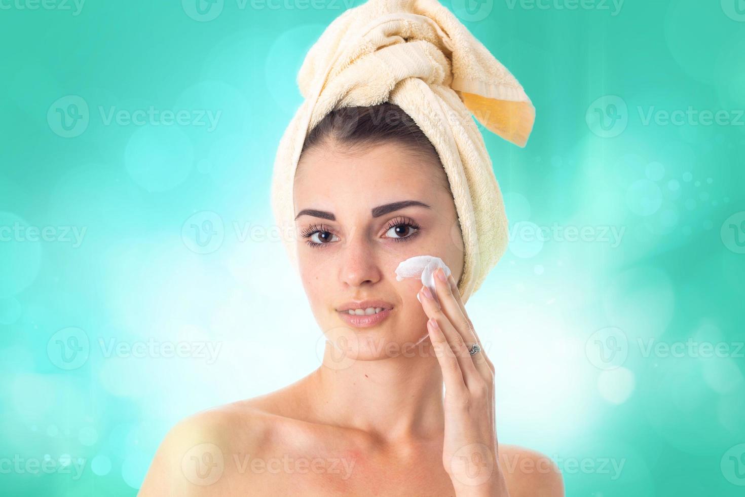 Young girl takes care her skin. photo