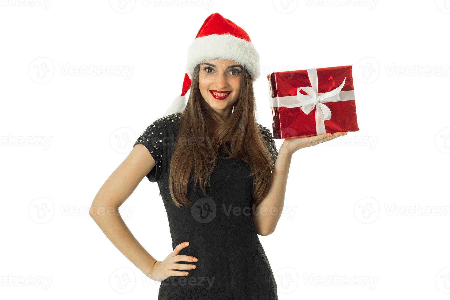 beautiful Girl in santa hat with smiling photo