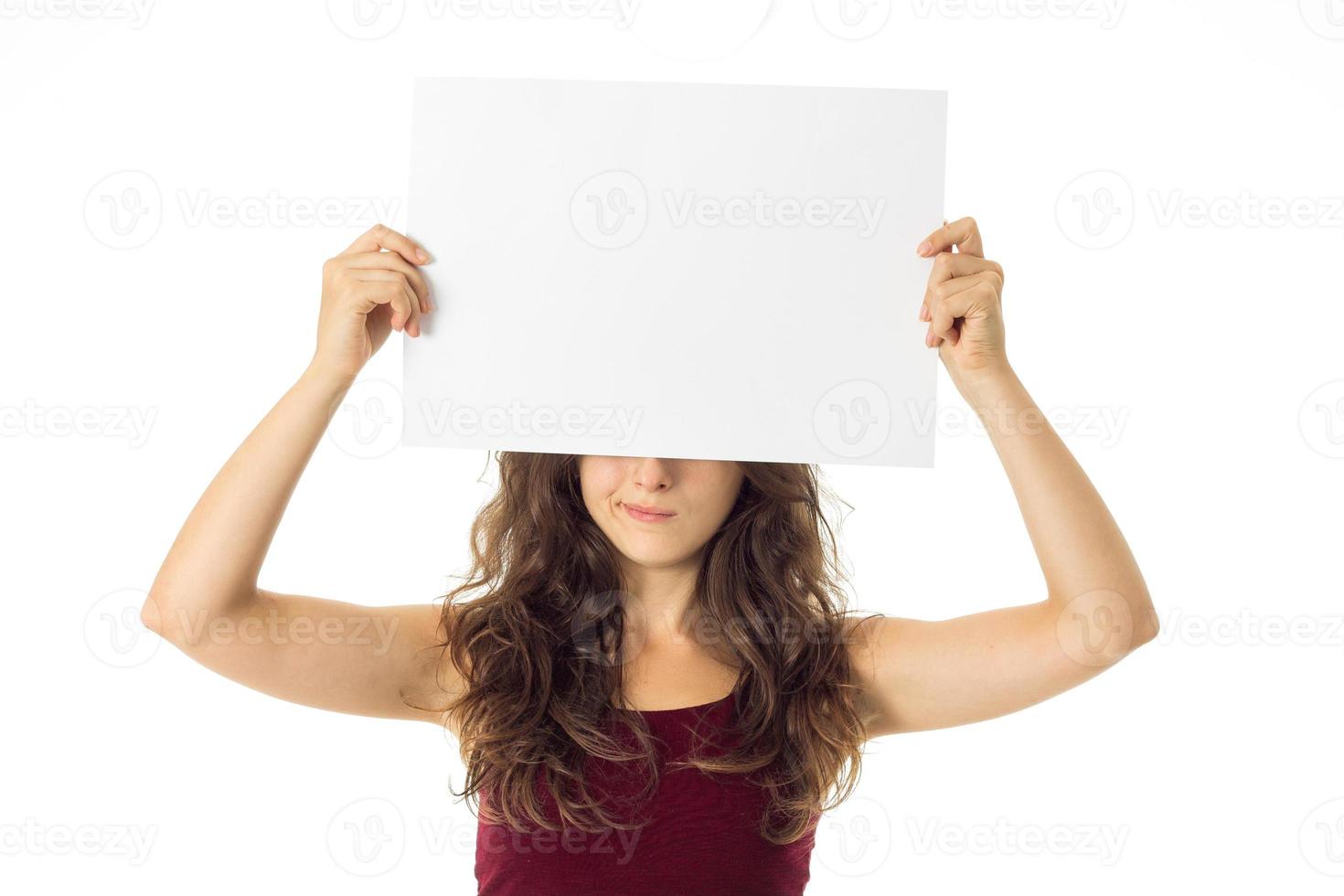 girl in red dress with white placard photo