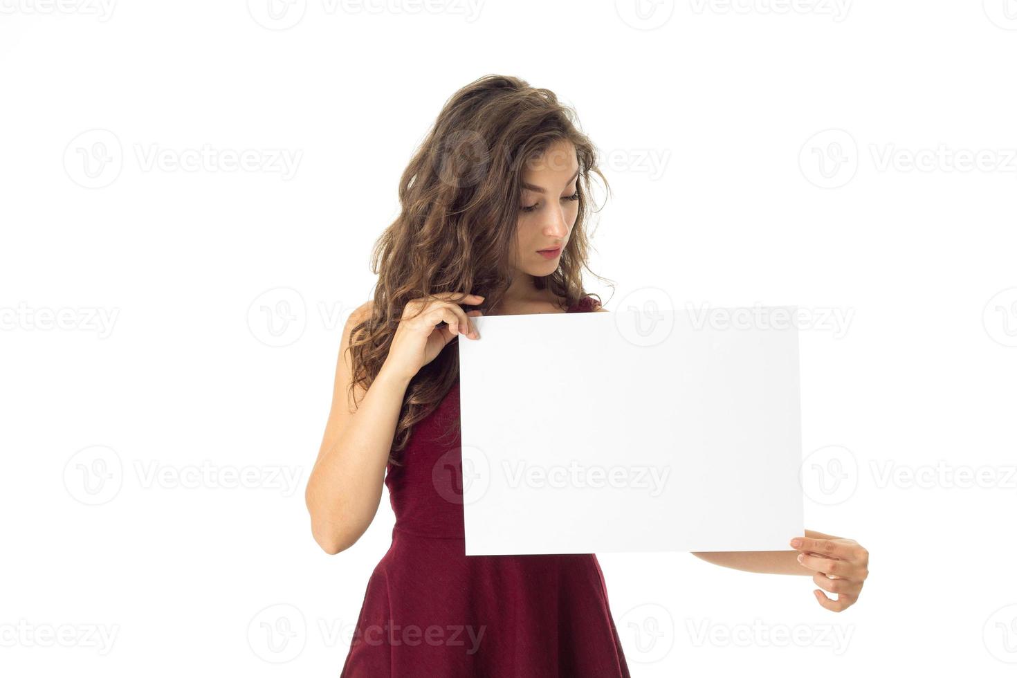 girl in red dress with white placard photo