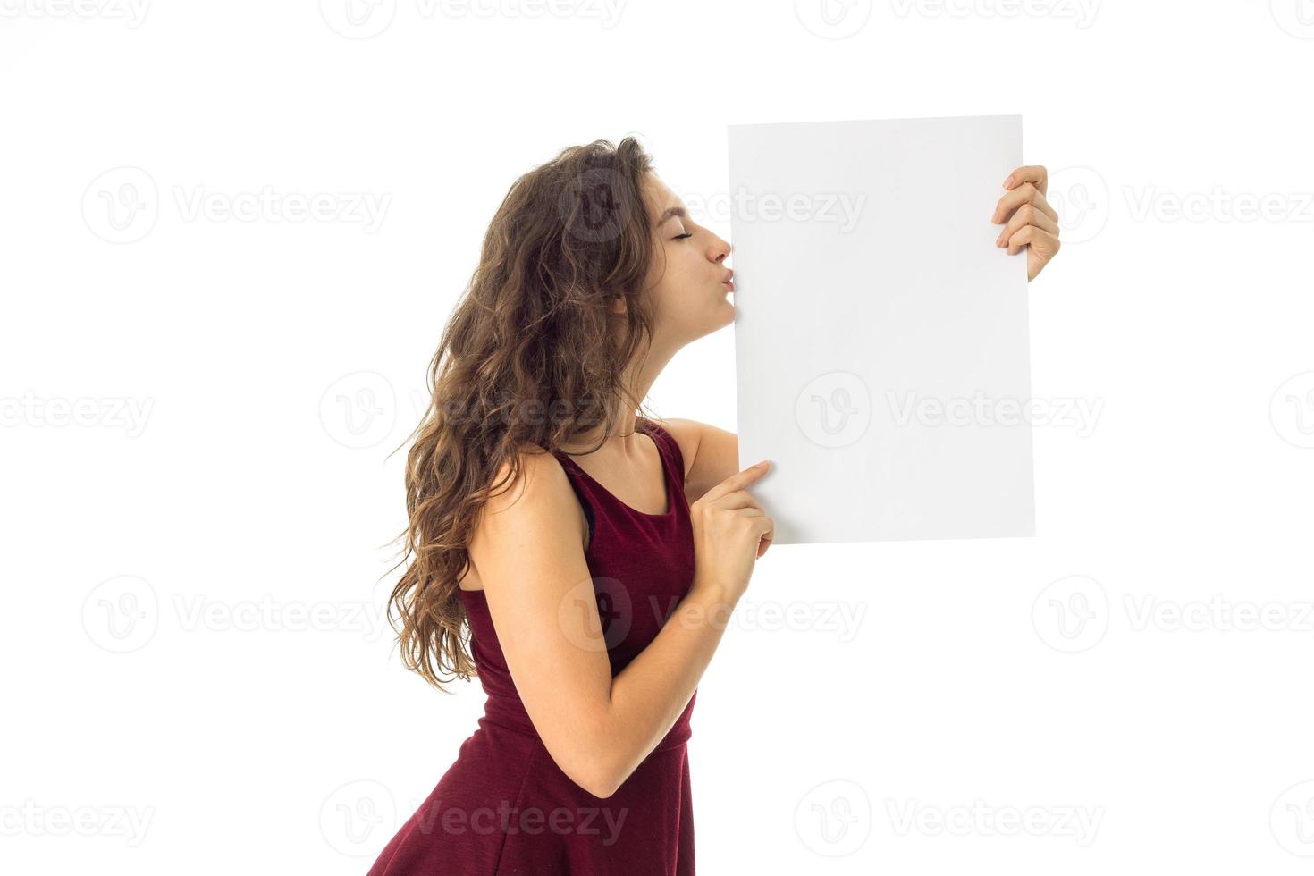 girl in red dress with white placard photo