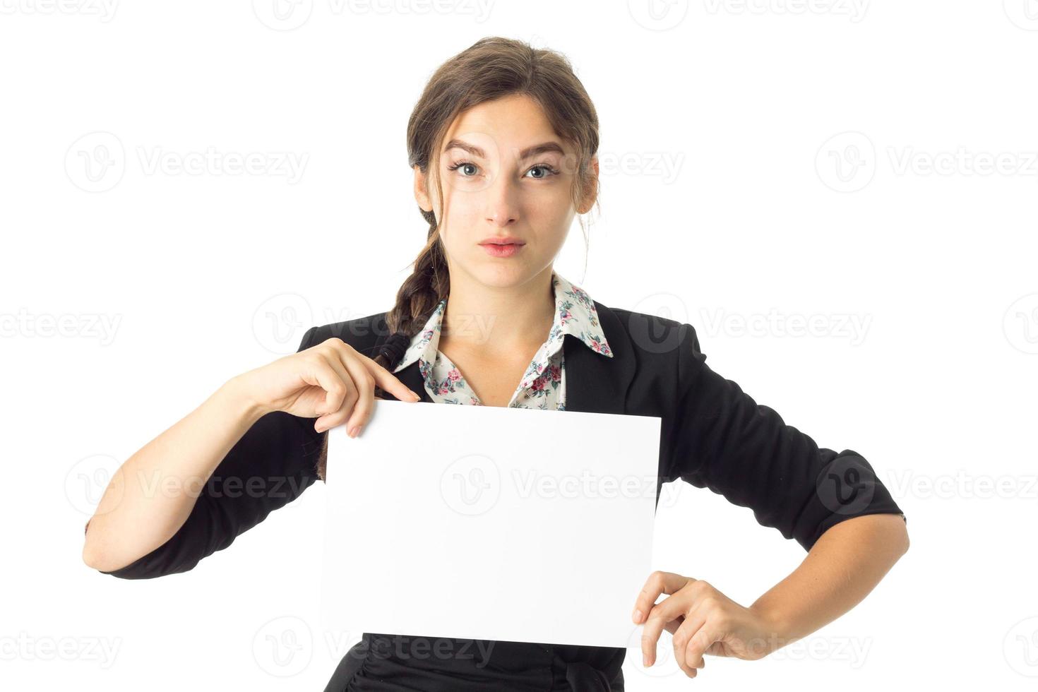 woman in uniform with white placard in hands photo