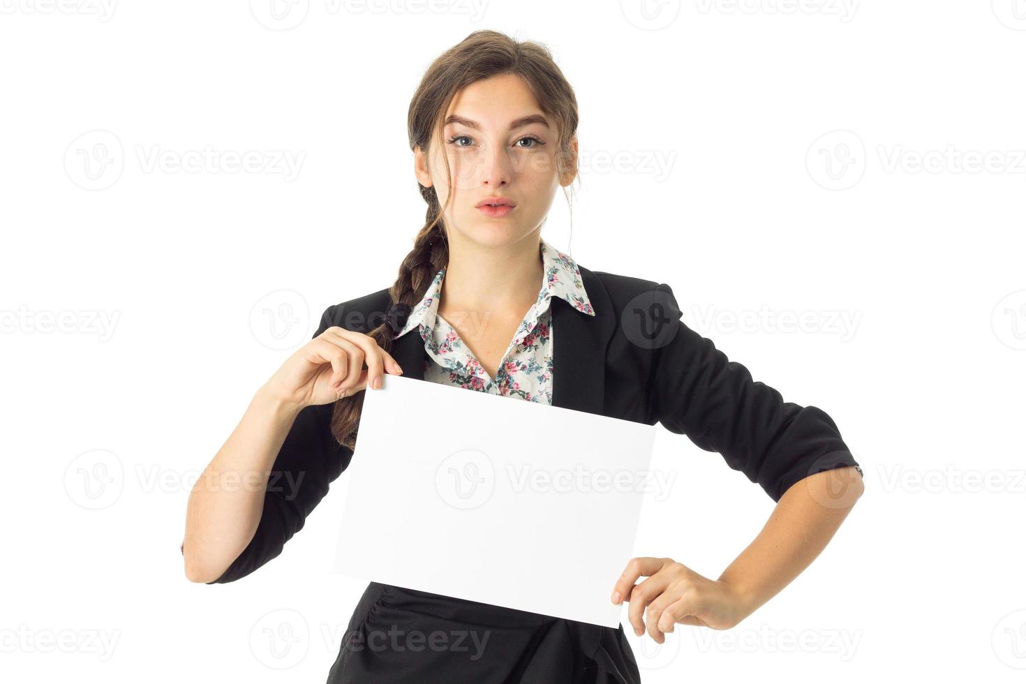 woman in uniform with white placard in hands photo