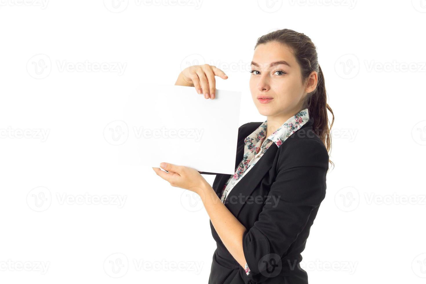 woman in uniform with white placard in hands photo